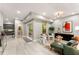 Inviting open-concept living room with modern furniture, stylish accents, and plenty of natural light at 1335 Elizabeth Ave Sw, Atlanta, GA 30310