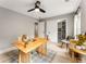 Comfortable office space with ceiling fan, desk, and chair, offering a functional and stylish workspace at 1335 Elizabeth Ave Sw, Atlanta, GA 30310