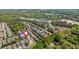 Aerial view of a neighborhood featuring sidewalks, lush trees, and community amenities at 2075 Old Georgian Nw Ter, Atlanta, GA 30318