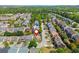 Aerial view of a neighborhood featuring tree-lined streets and manicured lawns at 2075 Old Georgian Nw Ter, Atlanta, GA 30318