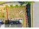 Aerial view of the backyard with a pool, patio, hammock, and green landscaping showing the entire backyard layout at 2075 Old Georgian Nw Ter, Atlanta, GA 30318
