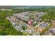 Aerial view of suburban neighborhood featuring sidewalks, mature trees, and community amenities at 2075 Old Georgian Nw Ter, Atlanta, GA 30318