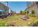 Beautiful backyard with a hot tub, patio seating, a hammock, lush greenery, and vibrant flowers at 2075 Old Georgian Nw Ter, Atlanta, GA 30318