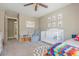 Bright Bedroom with a crib, daybed, and colorful accents, creating a joyful and inviting space for a young  at 2075 Old Georgian Nw Ter, Atlanta, GA 30318