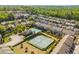 Aerial view of neighborhood with community pool, tennis courts, and green space at 2075 Old Georgian Nw Ter, Atlanta, GA 30318