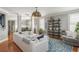 Cozy living room with hardwood floors, neutral colors, and ample seating at 2075 Old Georgian Nw Ter, Atlanta, GA 30318