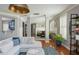 Open-concept living area with views to the dining room and kitchen, perfect for entertaining at 2075 Old Georgian Nw Ter, Atlanta, GA 30318