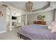 Spacious main bedroom includes a sitting area and decorative chandelier, perfect for relaxing at 2075 Old Georgian Nw Ter, Atlanta, GA 30318