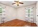 Cozy bedroom with hardwood floors and neutral decor, creating a tranquil and inviting space at 3800 Whitaker Ln, Lithia Springs, GA 30122