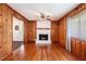 Spacious living room boasts hardwood floors and a cozy fireplace, perfect for relaxation at 3800 Whitaker Ln, Lithia Springs, GA 30122