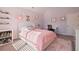 Cheerful bedroom with a bed, desk, decor, and great natural light at 4105 Woodwind Dr, Cumming, GA 30028
