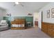 Well-appointed Bedroom featuring a crib, chair, and stylish decor at 4105 Woodwind Dr, Cumming, GA 30028
