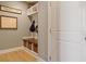 Mudroom with built-in bench, cubbies, and storage baskets at 4105 Woodwind Dr, Cumming, GA 30028