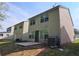 Exterior view of the home featuring a patio, siding and lawn at 5169 Hanover St, Atlanta, GA 30349
