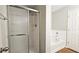 Bathroom featuring a glass shower and bathtub at 5169 Hanover St, Atlanta, GA 30349