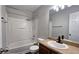 Bathroom featuring a shower-tub combo and stylish vanity at 5169 Hanover St, Atlanta, GA 30349