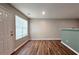 Cozy living room with wood flooring and abundant natural light at 5169 Hanover St, Atlanta, GA 30349