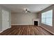 Bright and airy living room featuring a fireplace and wood-look floors at 5169 Hanover St, Atlanta, GA 30349
