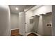 Walk-in closet featuring vinyl floors and multiple shelving units at 5169 Hanover St, Atlanta, GA 30349