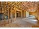 Unfinished basement with exposed framing and concrete flooring at 1285 Brynhill Ct, Buford, GA 30518