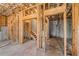 Basement with visible stud framing and concrete floor awaiting finishing at 1285 Brynhill Ct, Buford, GA 30518