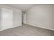 Spacious bedroom featuring neutral paint, carpeted floors, and a vaulted ceiling at 1285 Brynhill Ct, Buford, GA 30518