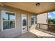 Exterior covered deck with railing and view of the backyard at 1285 Brynhill Ct, Buford, GA 30518