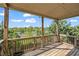Exterior wooden deck with railing overlooking trees at 1285 Brynhill Ct, Buford, GA 30518