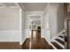 Bright foyer with hardwood floors leads to a spacious living room with a cozy fireplace at 1285 Brynhill Ct, Buford, GA 30518