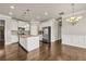 Modern kitchen with stainless steel appliances, granite countertops, and a functional center island at 1285 Brynhill Ct, Buford, GA 30518