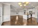 Open-concept space with a view of the kitchen featuring granite countertops, and stainless steel appliances at 1285 Brynhill Ct, Buford, GA 30518