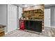 Finished Basement featuring a bar with fridge, sink, and modern shelving at 1326 Benbrooke Nw Ln, Acworth, GA 30101