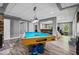 Basement featuring a pool table, small bar, and access to backyard at 1326 Benbrooke Nw Ln, Acworth, GA 30101