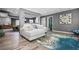 Finished basement with stylish sectional, finished bar, and decorative features at 1326 Benbrooke Nw Ln, Acworth, GA 30101