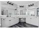 Bright bathroom featuring double sinks, granite countertops, and modern fixtures at 1326 Benbrooke Nw Ln, Acworth, GA 30101