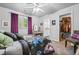 Bright bedroom features closet, vanity and purple accents at 1326 Benbrooke Nw Ln, Acworth, GA 30101