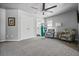 Bonus room with neutral walls, gray carpeting, seating, and a view of the bathroom at 1326 Benbrooke Nw Ln, Acworth, GA 30101