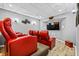 Home Theater featuring leather seating, a large screen TV, and unique décor at 1326 Benbrooke Nw Ln, Acworth, GA 30101