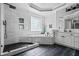 Beautiful main bathroom featuring a separate shower, soaking tub, and white subway tile at 1326 Benbrooke Nw Ln, Acworth, GA 30101