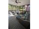 Comfortable screened-in patio featuring plush seating, perfect for relaxing and enjoying the outdoor views at 1326 Benbrooke Nw Ln, Acworth, GA 30101