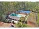 Community amenities include a pool, tennis court, and playground surrounded by a beautiful tree lined area at 1819 Yorkshire Dr, Woodstock, GA 30189