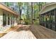 Spacious back deck area between home and screened porch, great for entertaining at 1819 Yorkshire Dr, Woodstock, GA 30189