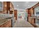 Spacious kitchen with custom cabinets, granite countertops, and stainless steel appliances at 1819 Yorkshire Dr, Woodstock, GA 30189