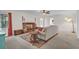 Spacious living room with brick fireplace, carpeted floor, and neutral decor at 1819 Yorkshire Dr, Woodstock, GA 30189