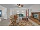 Spacious living room with brick fireplace, carpeted floor, and neutral decor at 1819 Yorkshire Dr, Woodstock, GA 30189