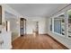 Living room has gleaming hardwood floors and serene views of the backyard at 1819 Yorkshire Dr, Woodstock, GA 30189