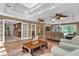 Open concept living room with access to kitchen, with neutral decor at 1819 Yorkshire Dr, Woodstock, GA 30189