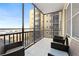 Screened balcony with comfortable seating and great views of the city skyline at 300 Peachtree Ne St # 21H, Atlanta, GA 30308