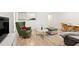 Bright living room features wood floors and lots of space for entertaining guests at 300 Peachtree Ne St # 21H, Atlanta, GA 30308