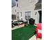 Backyard patio featuring cozy seating, a grill, and easy access from the house at 7881 Chadwick Ln, Riverdale, GA 30274